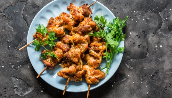 Brochetas de pato con naranja