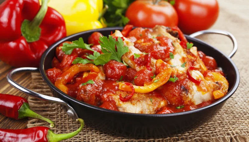 Muslos de pollo con pimientos