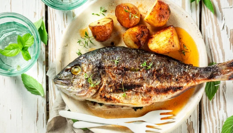 Dorada al horno con patatas