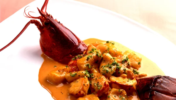 Langosta en salsa de miel