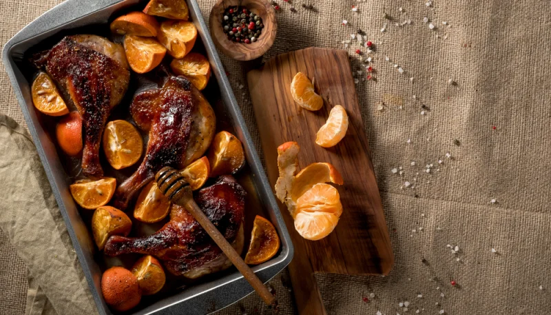 Muslos de pollo con mandarinas