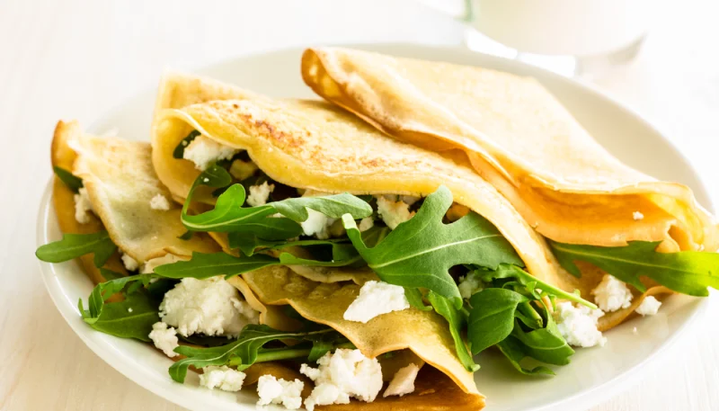 Crepes de rúcula y queso